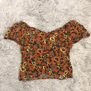 Floral print shirt for girls. Size is M 7-9. Shirt buttons up.